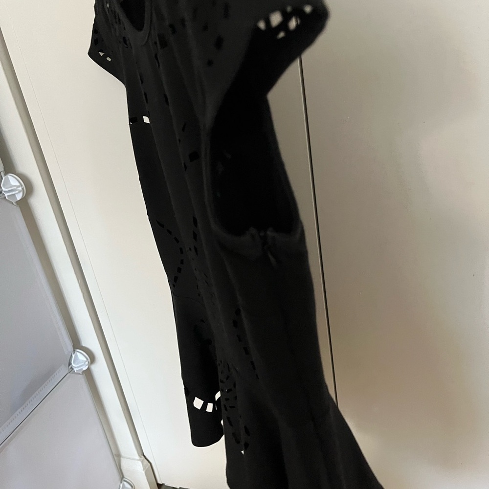 Elegant Black Peplum Top - Picture 4 of 5